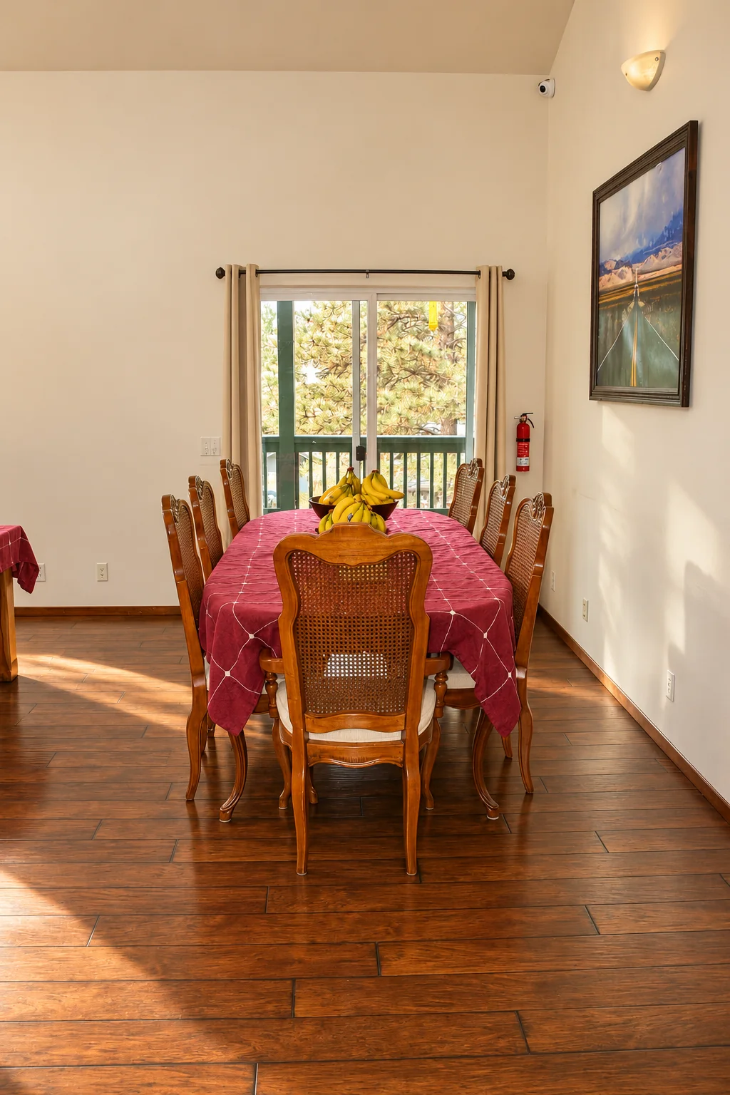 Dining table beside a sunny window